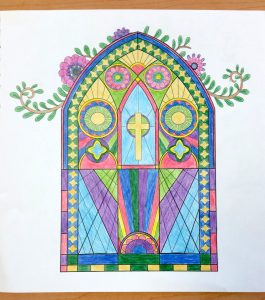 Katherine's finished coloring project of stained glass from Amazing Grace by Zondervan.